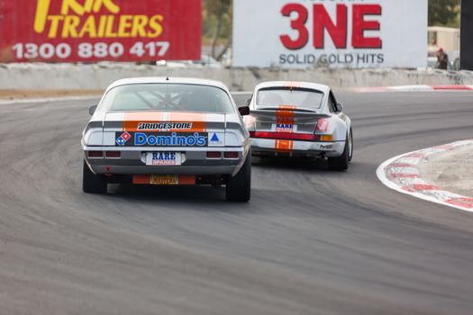 MELBOURNE, WINTON/AUSTRALIA, 22 MAY , 2016: Classic race cars rouding turn 1 at Winton.