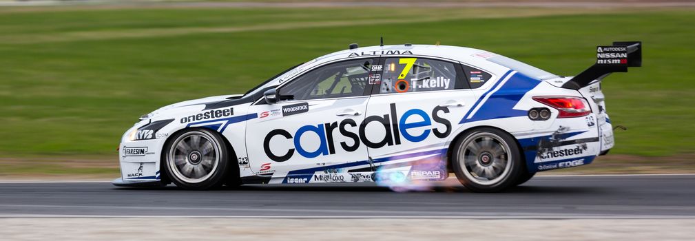 MELBOURNE, WINTON/AUSTRALIA, 22 MAY , 2016: Virgin Australia Supercars Championship  - Todd Kelly (Carslaes Racing) spitting fire during Race 10 at Winton.