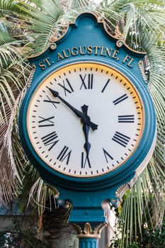 A pedestal street clock in historic St. Augustine, Florida, USA
