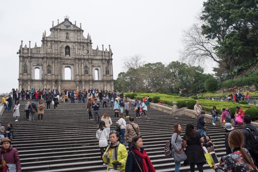 MACAU - March 14, 2016: Ruins of Saint Paul's Cathedral - the famous landmarks of Macau. The Historic Centre of Macau, a UNESCO World Heritage Site.