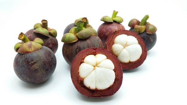 A group of mangosteen on the white background
