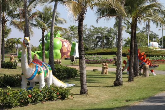 dinosaur statue in garden