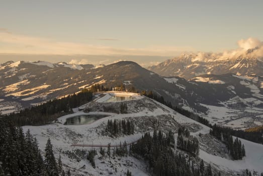 View of the Austrian Alps in the winter at sunset