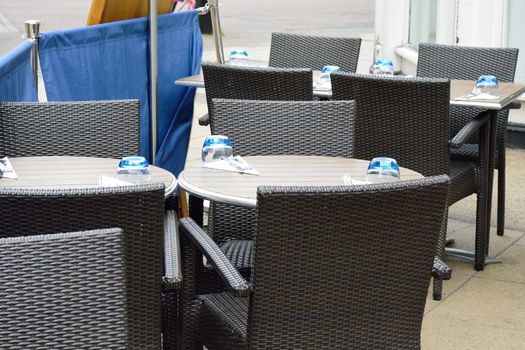 Empty Outdoor Rattan Dining Tables