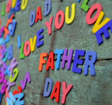 I love you dad message for father, group of colourful letters to happy father day, wooden alphabet wood background