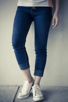 young woman in blue jeans
