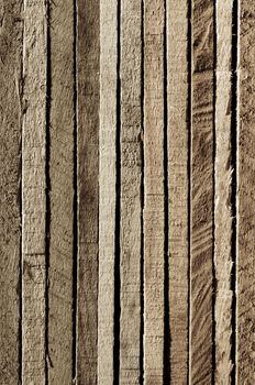 Variegated Natural Colored Background of Cracked Wooden Plank closeup. Sepia Toned