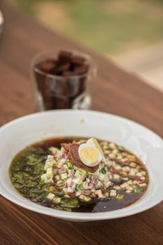 Traditional Russian kvass soup with vegetables - okroshka