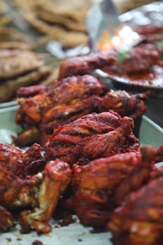 Delicious and spicy Indian delicacy tandoori chicken served in a plate