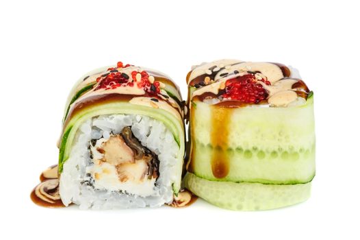 Uramaki maki sushi, two rolls isolated on white. Eeel with philadelphia, cucumber, sesame, red tobiko and tempura sauce