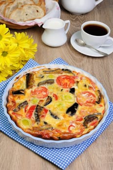 Omelette eggplant, leek, tomatoes and pepper with cheese