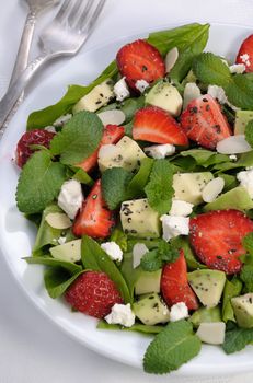 Salad spinach with strawberries, avocado, mint, ricotta and sesame,poppy seeds 