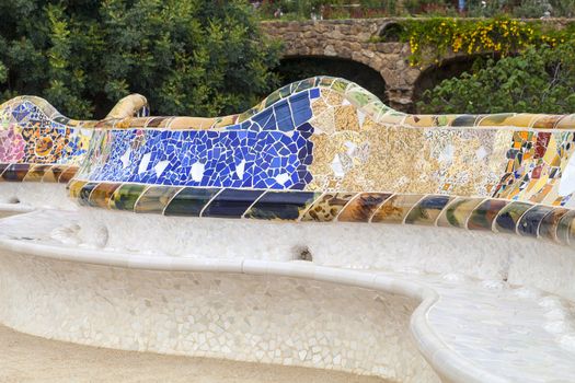 Gaudi multicolored mosaic bench  in Park Guell; Barcelona; Spain