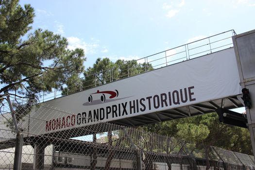 Monte-Carlo, Monaco - April 28, 2016: Red and White Monaco Grand Prix Historique Signboard in Monte-Carlo, Monaco