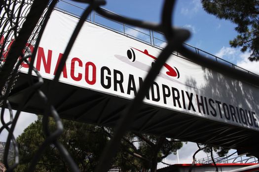 Monte-Carlo, Monaco - April 28, 2016: Red and White Monaco Grand Prix Historique Signboard in Monte-Carlo, Monaco