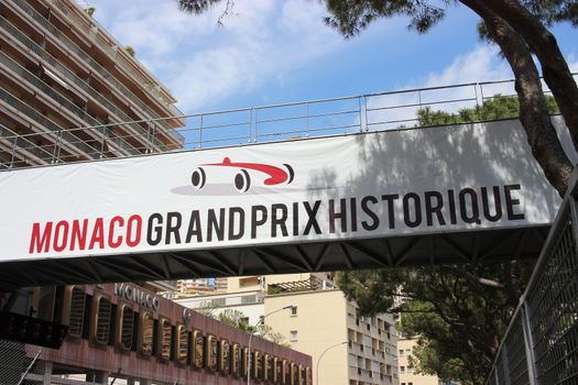 Monte-Carlo, Monaco - April 28, 2016: Red and White Monaco Grand Prix Historique Signboard in Monte-Carlo, Monaco