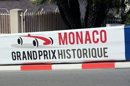 Monte-Carlo, Monaco - May 18, 2016: Red and White Monaco Grand Prix Historique Signboard in Monte-Carlo, Monaco