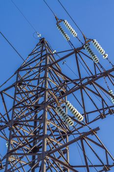 electric insulator on the background of blue sky