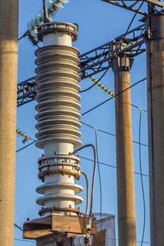 electric insulator on the background of blue sky