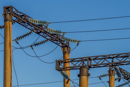 electric insulator on the background of blue sky