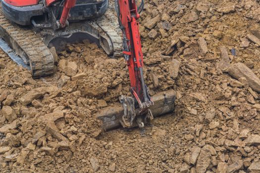 Mini excavator with excavation work for a new construction home.
