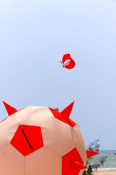 colorful kite in the blue sky at the summer holidays time