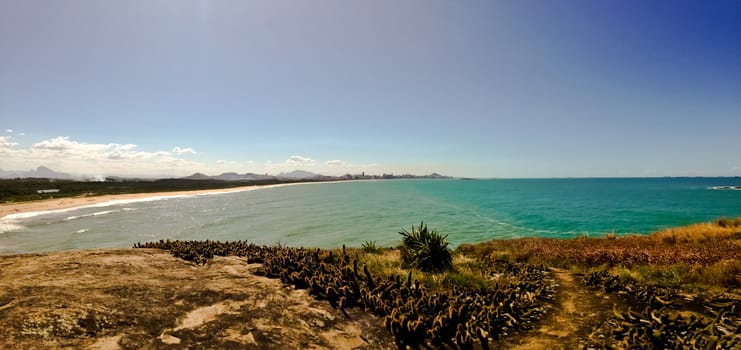Panoramic beach and city from high grounds