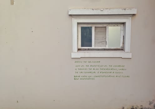 recipe written in green underneath old window