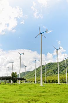 Group wind turbine generator of clean energy under the blue sky in Thailand