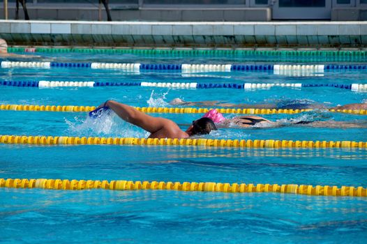 swimmer in the big outdoor swimming pool