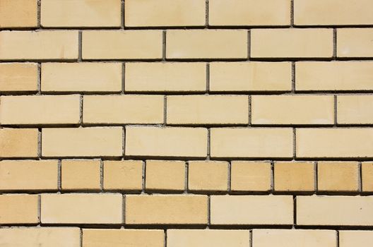 House wall element from a yellow brick