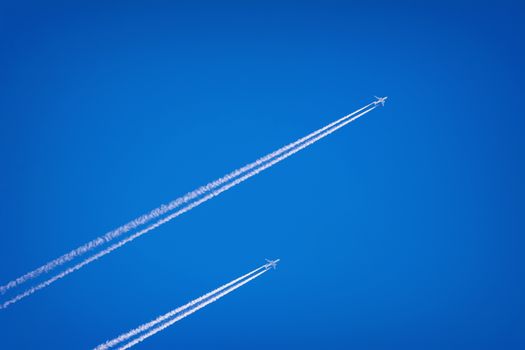Two Jet Airplanes in the Blue Sky