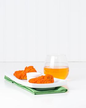 Buffalo chicken wings on a more elegant place setting.