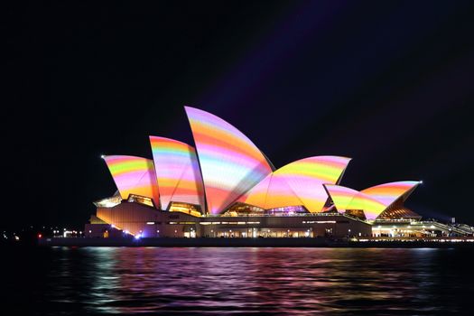 SYDNEY, AUSTRALIA - MAY 29, 2016;  Sydney Opera House in a rainbow of colour during the Vivid Sydney Annual Event