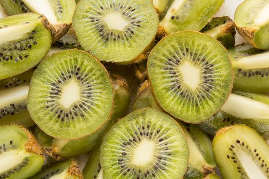 Fresh organic Kiwi Fruit Slices arranged showing the pips & structure