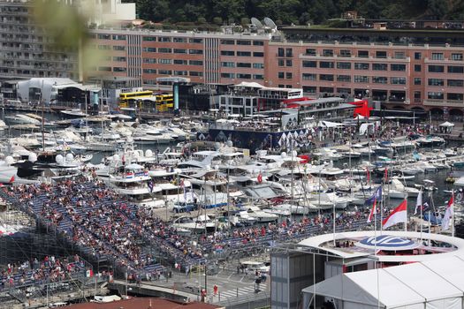 La Condamine, Monaco - May 28, 2016: Many Spectators in the Tribunes and People on Yachts For the Monaco Formula 1 Grand Prix 2016

