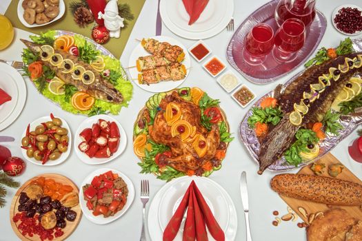 Lots of traditional festive food on table. Christmas table.