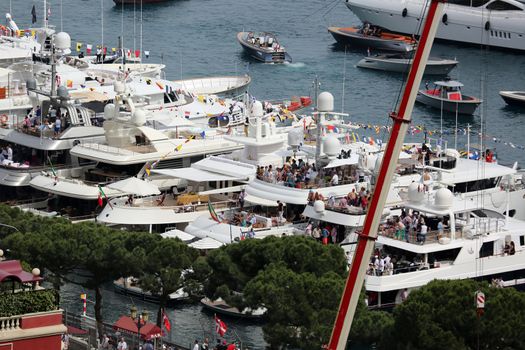 La Condamine, Monaco - May 28, 2016: Luxury Yachts are Parked in the Port Hercule for the Monaco Formula 1 Grand Prix 2016

