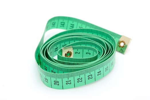 Detail image of twisted green inch tape. 
