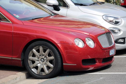 Monte-Carlo, Monaco - May 28, 2016: British Luxury Car Bentley Continental GTC Badly Parked on the Sidewalk in Monaco