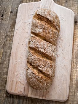 close up of freshly baked crispy crust wholemeal brown bread