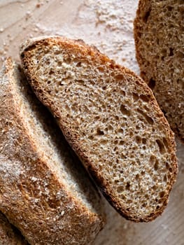 close up of freshly baked crispy crust wholemeal brown bread