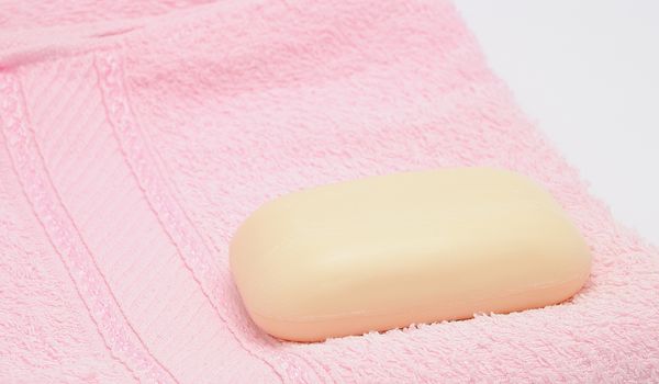 Small soap on the pink towel.