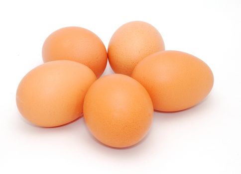 Five eggs isolated on the white background.