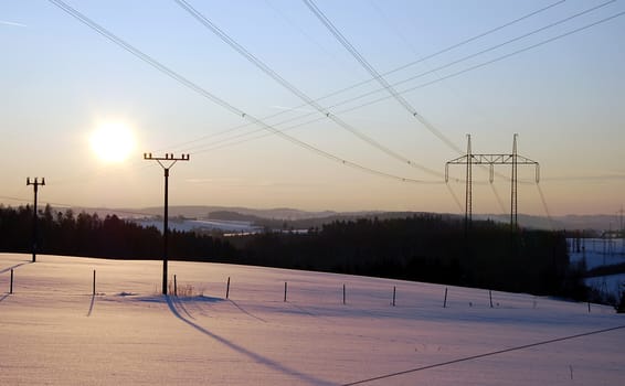 Winter landscape with power line.