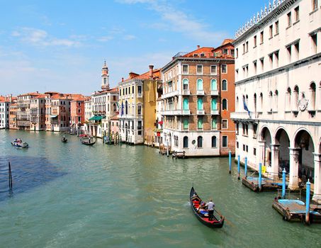 Gondolas pass main canal at Venice in Italy.