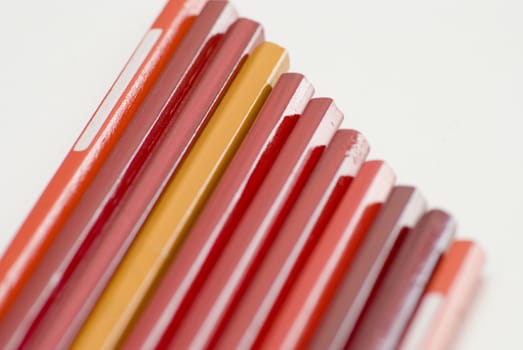 Detail shoot of yellow and red pencils.