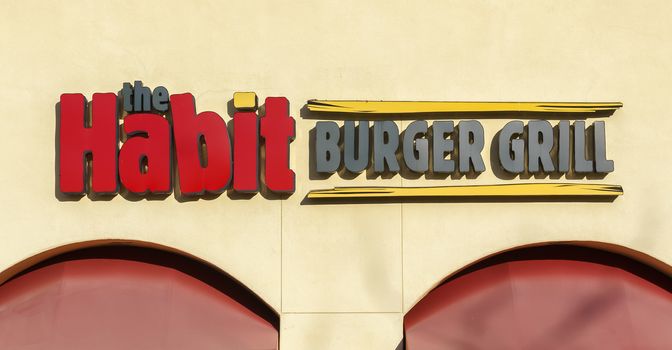 SANTA CLARITA, CA/USA - DECEMBER 28, 2015: The Habit Burger Grill exterior and logo. The Habit is a fast casual restaurant chain.