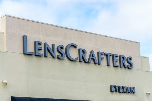 NORTHRIDGE, CA/USA - DECEMBER 28, 2015: LensCrafters store and logo. LensCrafters is a retailer of prescription eyewear, and prescription sunglasses.