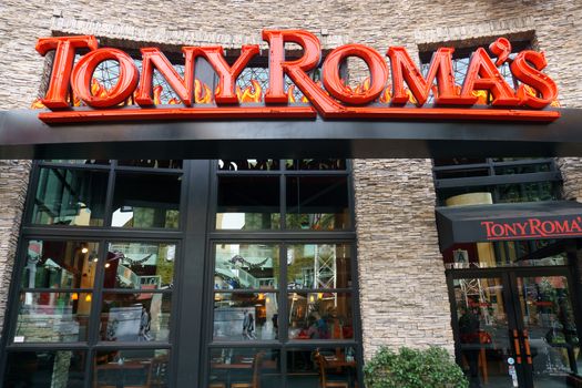 UNIVERSAL CITY, CA/USA DECEMBER 22, 2015: Tony Roma's restaurant exterior and logo. Tony Roma's is a casual dining chain restaurant specializing in baby back ribs.